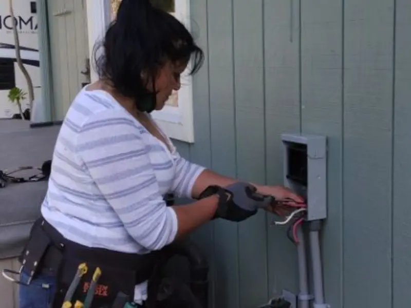 Licensed electrician wiring an exterior subpanel in Philadelphia